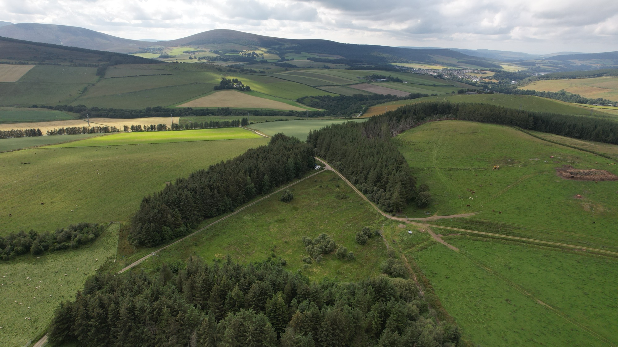 An aerial view of our campervan, Walden, parked on the track below Auchindoun Castle, Moray.