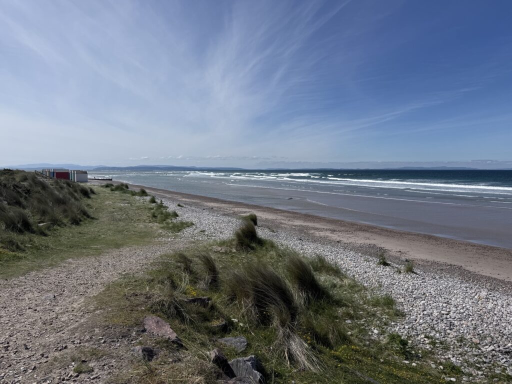 The North Sea meeting the long shoreline at Findhorn Beach