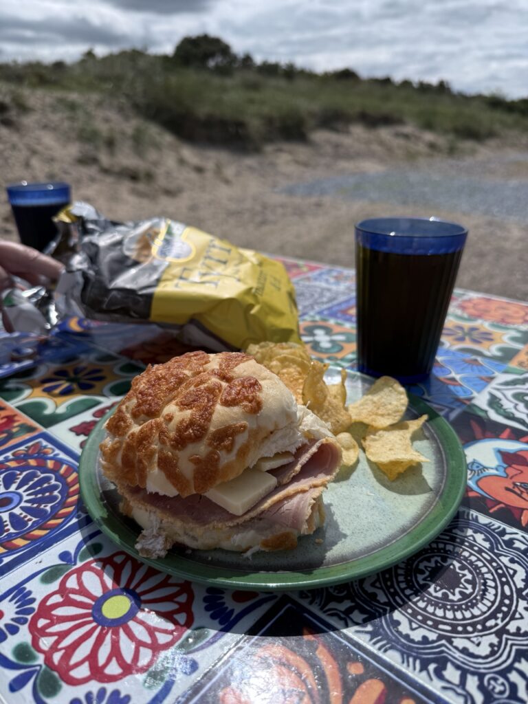 A simple meal outdoors by the sea at Findhorn, eaten in the fresh salt air