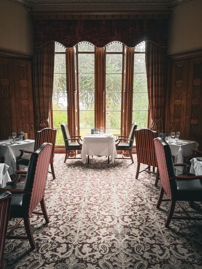 An elegant dining room set for breakfast at Pittodrie House